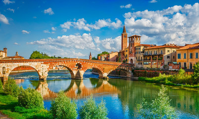 Bridge Ponte Pietra in Verona on Adige river - obrazy, fototapety, plakaty