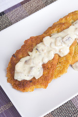 potato pancakes with mushroom sauce
