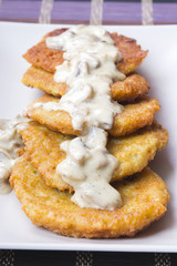 potato pancakes with mushroom sauce
