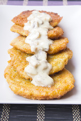 potato pancakes with mushroom sauce
