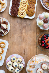 Cake, cookies, cakepops, waffers, cupcakes and tarts. Copy space