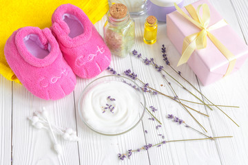 baby organic cream with lavender on shelf in bathroom