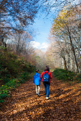 Mother and son enjoying autumn