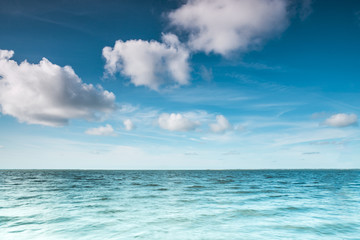 Wind surfer on a calm ocean at the North Sea