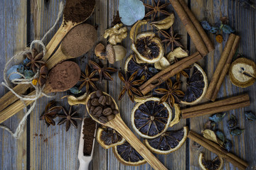 Fototapeta na wymiar composition of dried lemon, cinnamon coffee