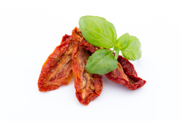 Dried tomatoes isolated on white background.