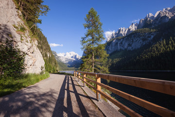 Road along Alpine mountain lake