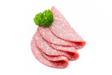 Salami smoked sausages slices isolated on white background.