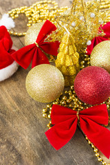 Christmas and New Year card with golden and red decor toys 