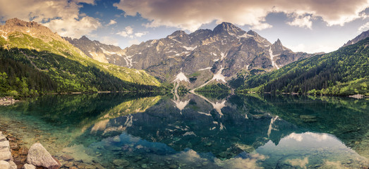 Panoramic view on Tatra mountains and lake