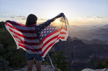 Woman with Union Jack Over The Grand Canyon
