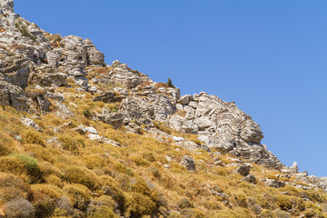 Layered rock formation folds on the Mediterranean island Crete, Greece