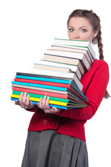 girl standing with a bunch of books