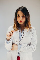 Doctor holding eyeglasses