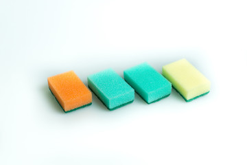 Sponges for washing close-up on the table. Fight with dirt. Cannon Housewives.