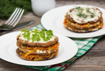 Cake from liver pancakes and vegetables.