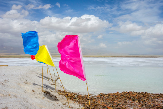 Colorful flags by Chaqia salt lake, China
