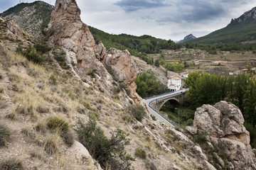 Fototapeta na wymiar view of Sierra de San Just mountain and the bridge over Martín river in Montalban, Teruel province, Spain