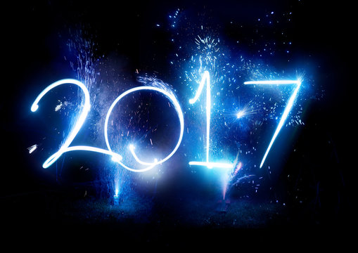 2017 Fireworks party -  Happy New Year Display celebrations! 2017 written in light trails and fireworks.