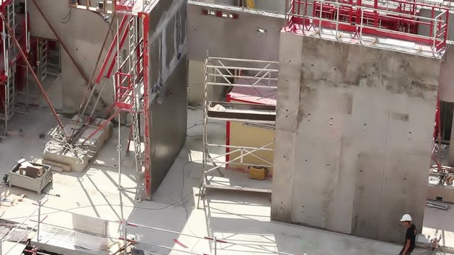 A Large construction site in Paris with Eiffel Tower in the background
