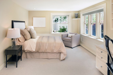 decorated beige Bedroom.