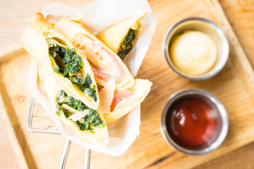Fried spring roll with ham cheese and spinach vegetable