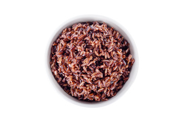 cooked red rice in white bowl on white background