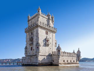 Fototapeta na wymiar The famous Belem Tower in Lisbon, Portugal. Classified as UNESCO World Heritage it stands as the best example of the Manuelino art.