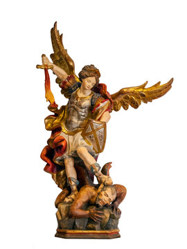 18th century Saint Michael Archangel statue created in the Baroque art style isolated on a white background