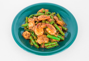 Beans and fried shrimp with vegetable oil, spices and spicy.