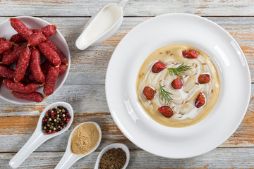 Beer and cream spicy Soup with Kielbasa Sausage