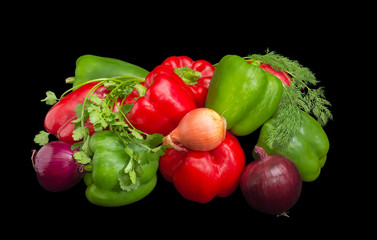 Several green and red bell peppers, onions and greens