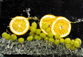 Fototapeta na wymiar Oranges, Water And Ice