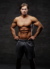 Fototapeta na wymiar Studio portrait of shirtless muscular male.