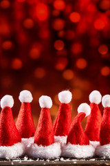 Group of festive red Santa Christmas hats