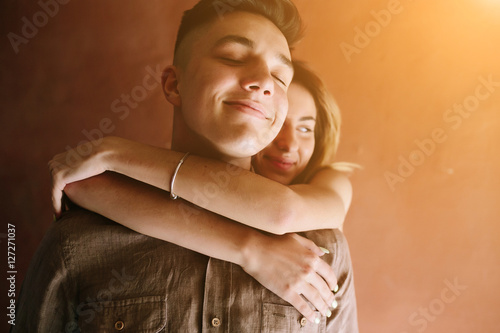 "girl hugging guy from behind" Stock photo and royalty-free images on ...