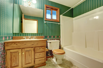Green bathroom interior design in vintage style