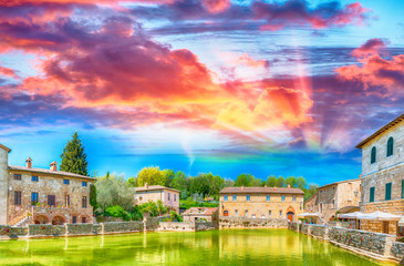 Naklejka premium Bagno Vignoni at sunset. Medieval Tuscan Town, Italy