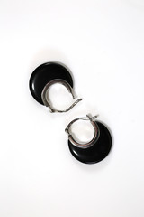 earrings of black onyx isolated on white background