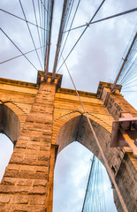 Fototapeta premium Brooklyn Bridge tower at sunset