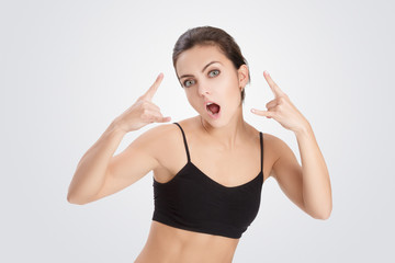 woman shows a sign of rock