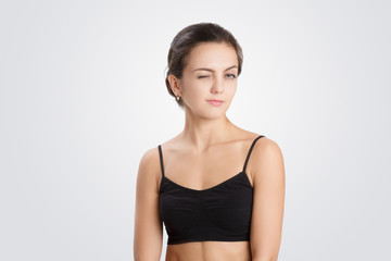 Fototapeta premium portrait of a young woman winking