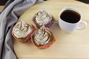 tiramisu cupcakes homemade cakes coffee dessert coffee on a wooden background dark light pink gentle cream