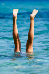 Handstand im Meer