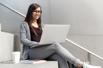 Casual lifestyle of business woman independent freelance worker with computer laptop and coffee