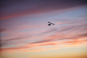 Fototapeta na wymiar Hang glider flying with pilot