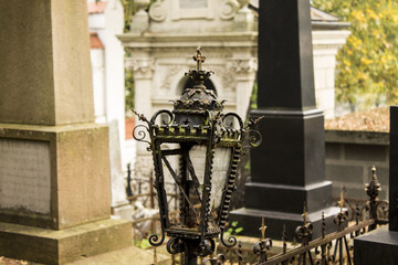 Old destroyed light a candle in the cemetery