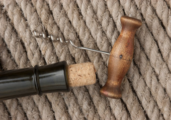Old corkscrew and bottle