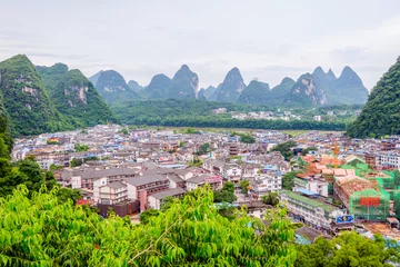 Poster Skyline of Yangshuo city with Li River, China © dinozzaver