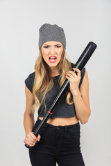 Fototapeta premium Cool hot fashionable criminal woman bandit dressed in hat with b